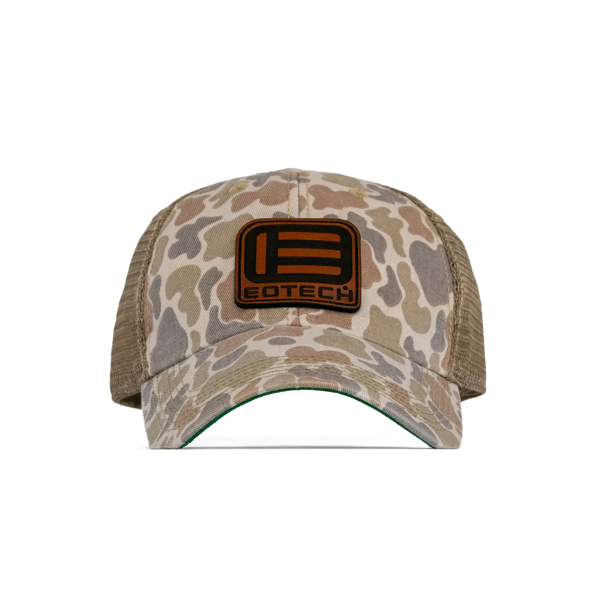 A duck camouflage trucker hat with tan mesh back panels and a brown leather patch on the front featuring the EOTECH logo.