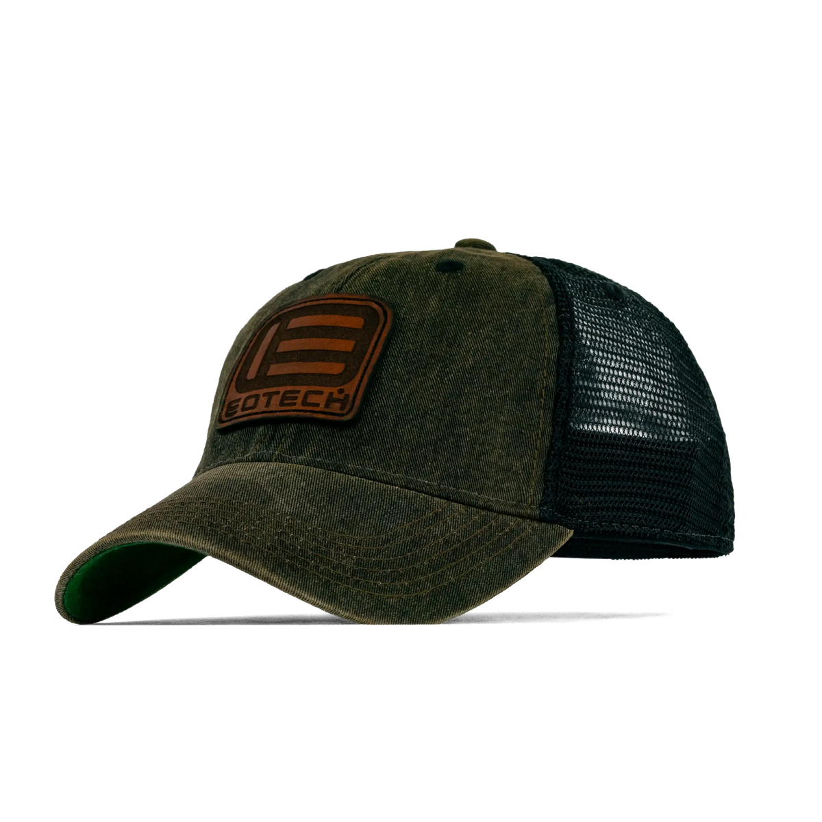 A trucker-style baseball cap with a washed olive green front panel and brim, black mesh back, and a brown leather patch on the front displaying the brand name 'EDTECH'.