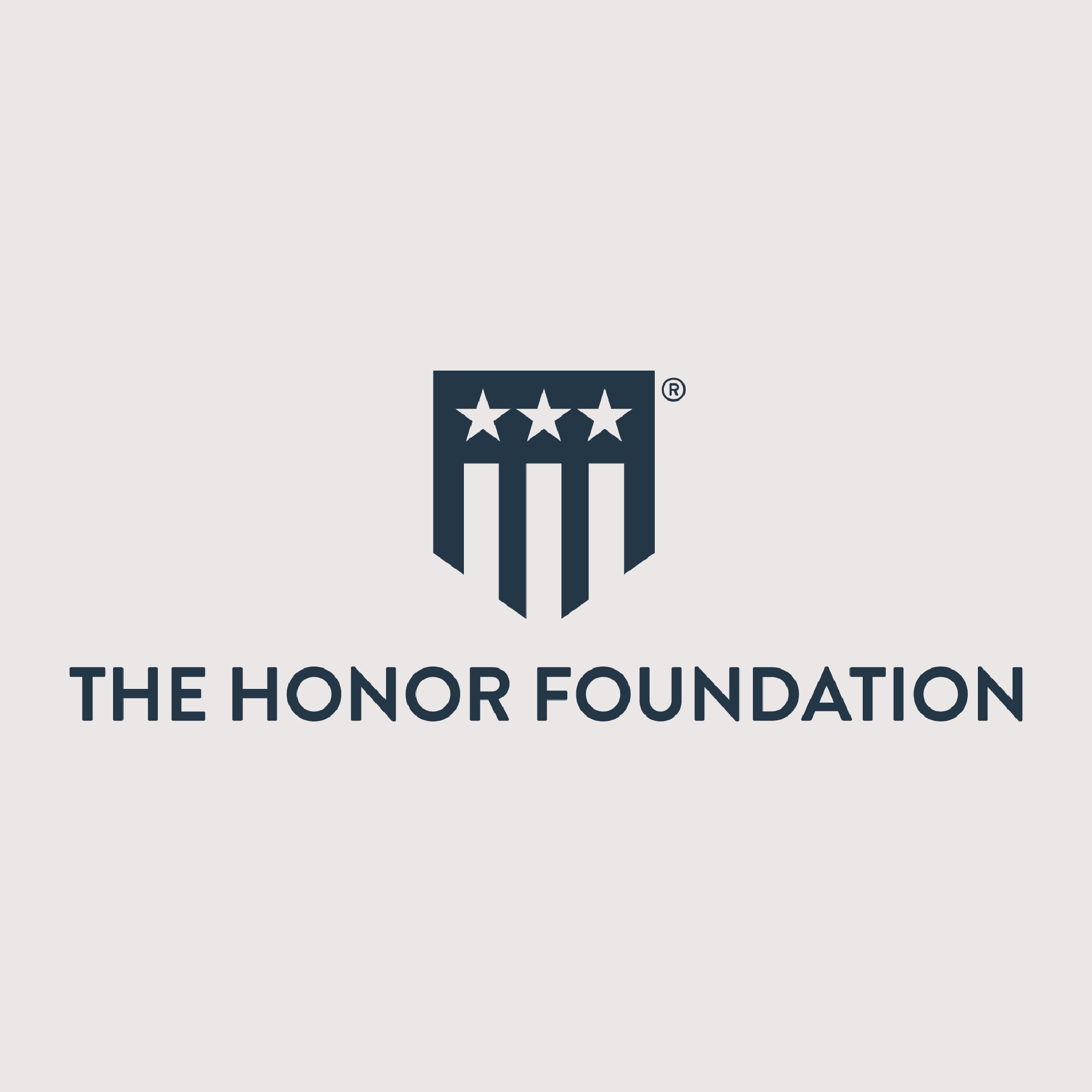 Logo of The Honor Foundation on a gray background