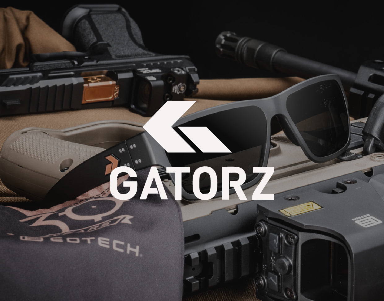 Sunglasses with Gatorz branding and EOTECH bag on a tactical background