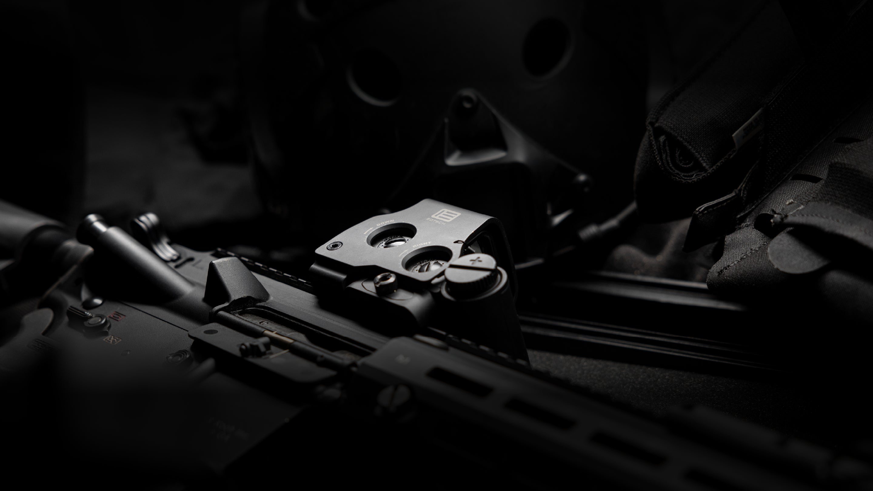 Close-up of a rifle with EOTECH HWS optic