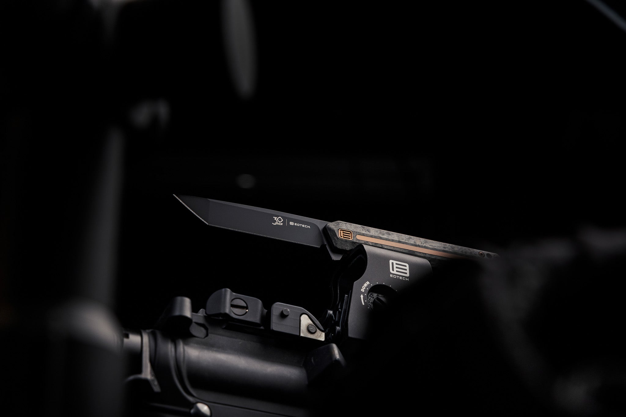 Close-up of a EOTECH actical knife with a dark background