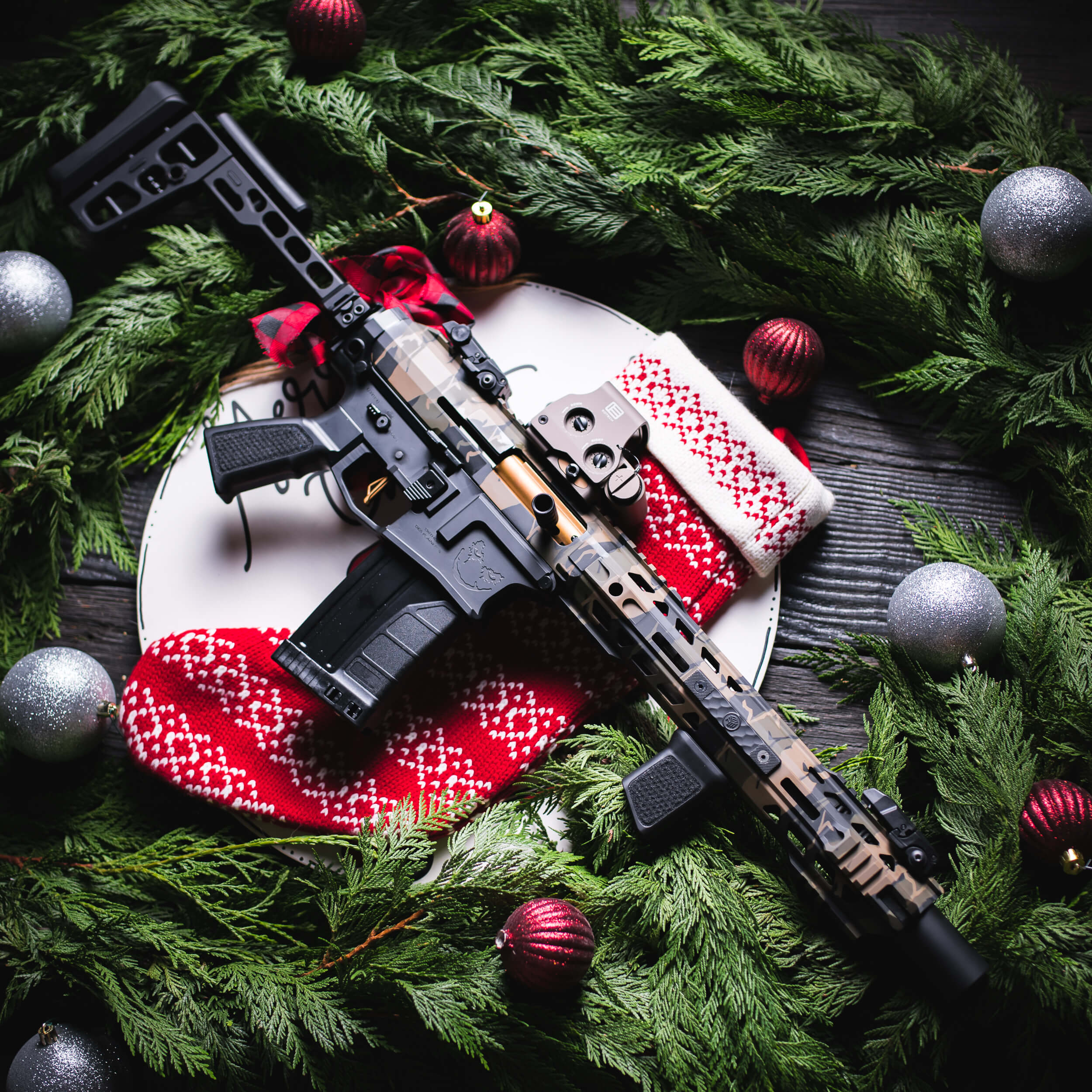 HWS on a firearm laying on holiday background