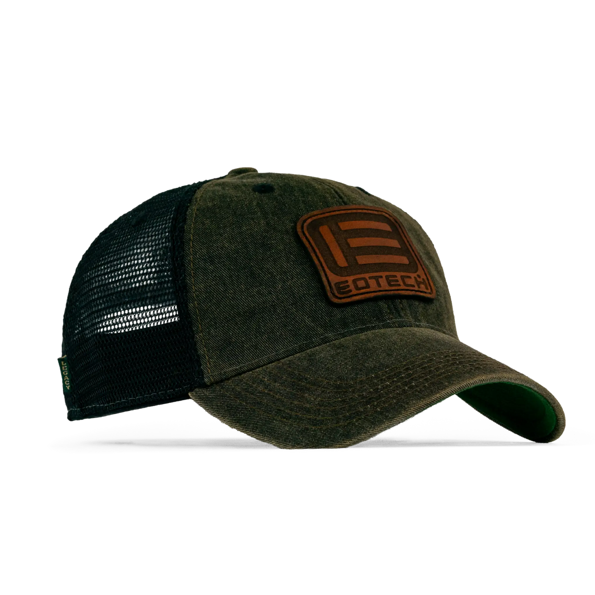 A trucker-style baseball cap with a washed olive green front panel and bill, black mesh back, and a brown rectangular patch on the front featuring a stylized 'E' logo and the word 'EOTECH'.