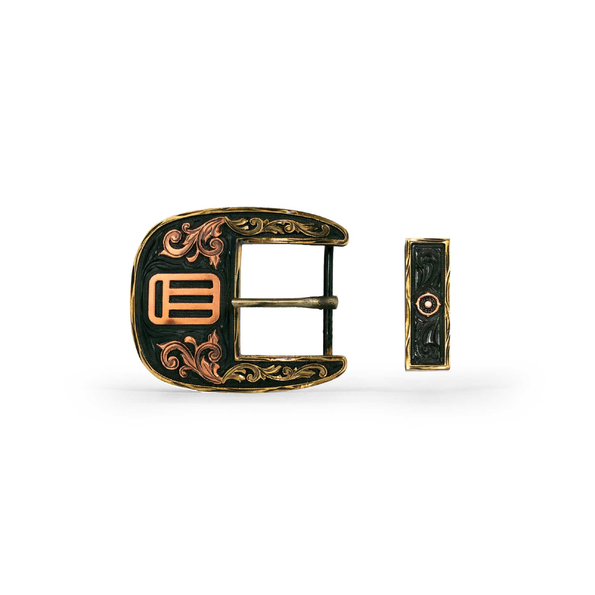 An ornate western-style belt buckle with gold-toned metal edges, and copper-toned scrollwork and geometric details, shown alongside its matching keeper on a white background.
