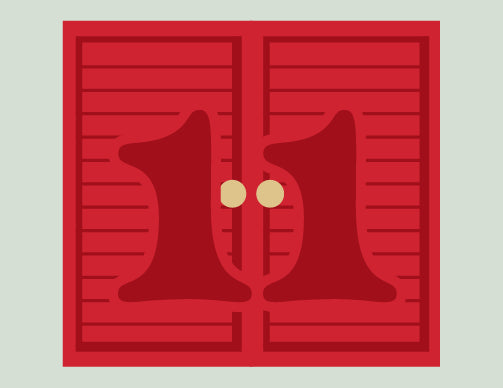 Red door with two gold doorknobs on a light gray background