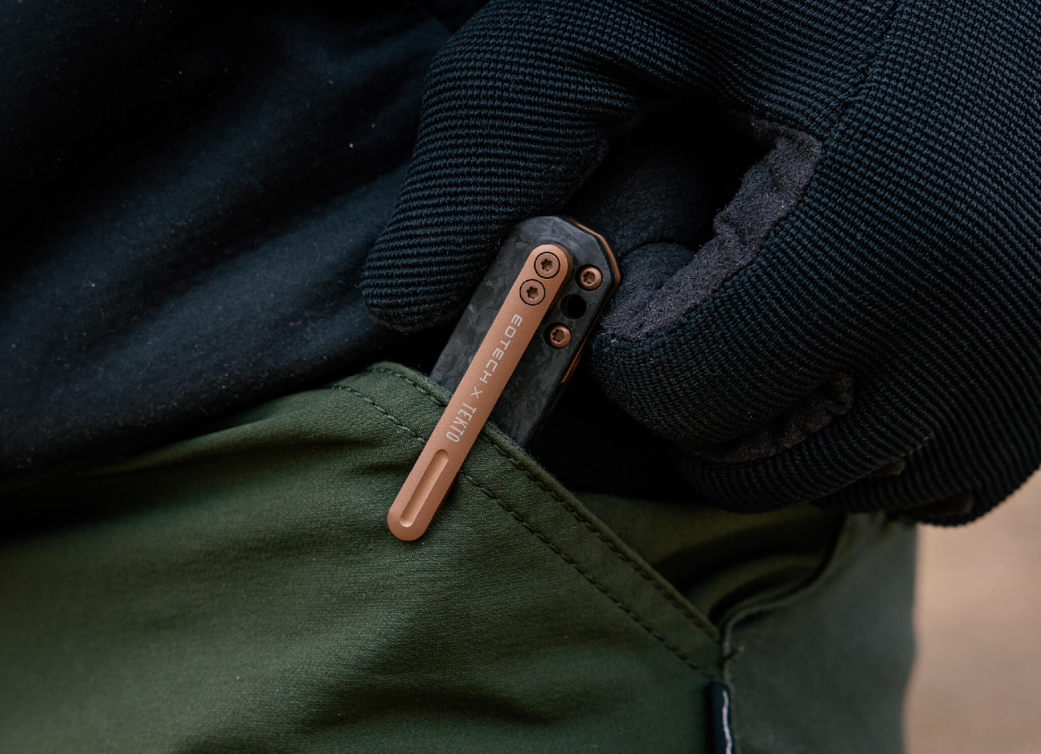 EOTECH Knife in a pocket with a focus on functionality and design.