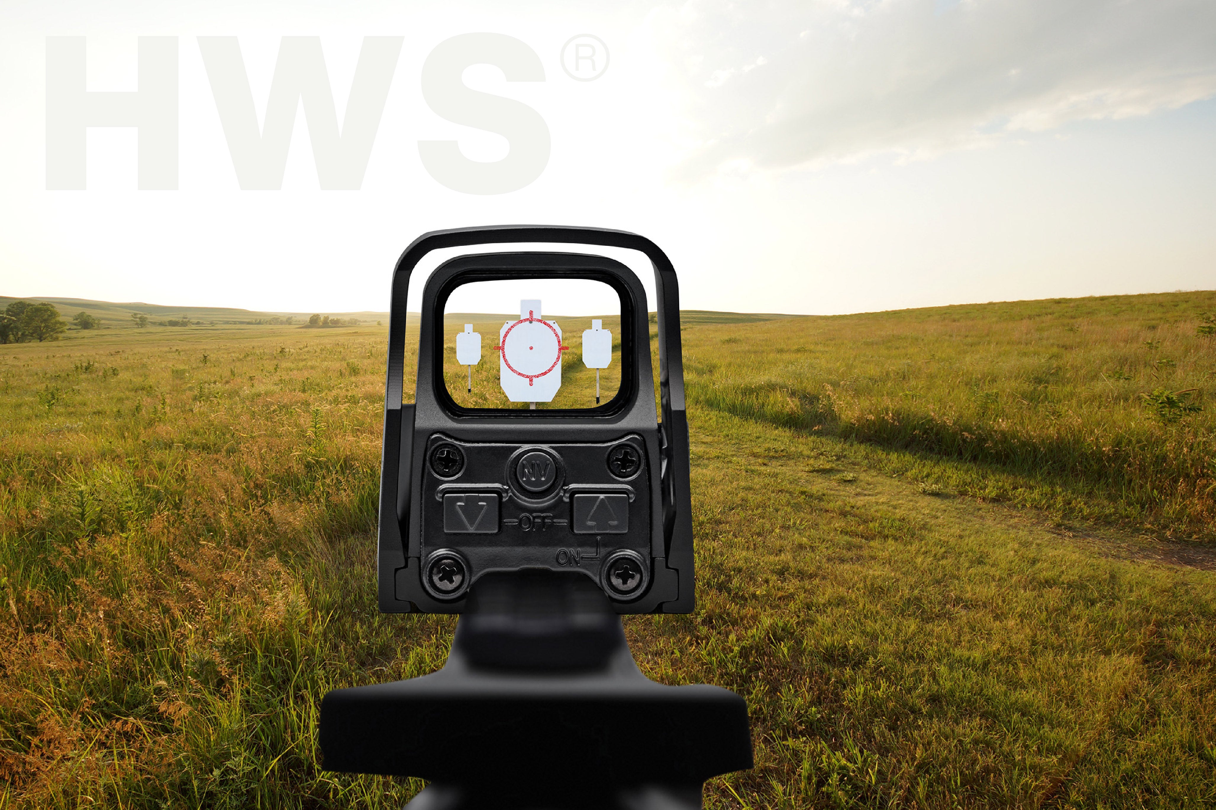 EOTECH HWS optic POV Rifle with a target reticle on a grassy field background