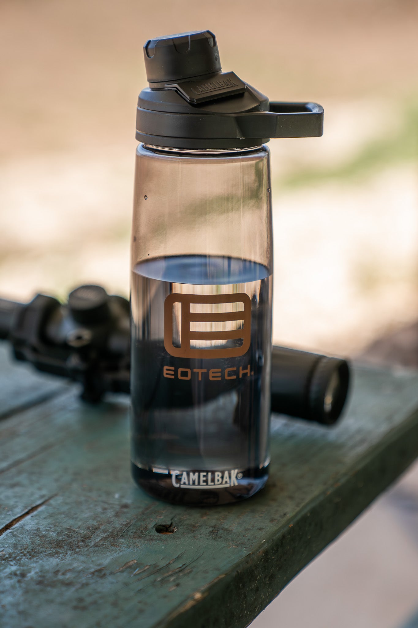 EOTECH water bottle on a wooden surface