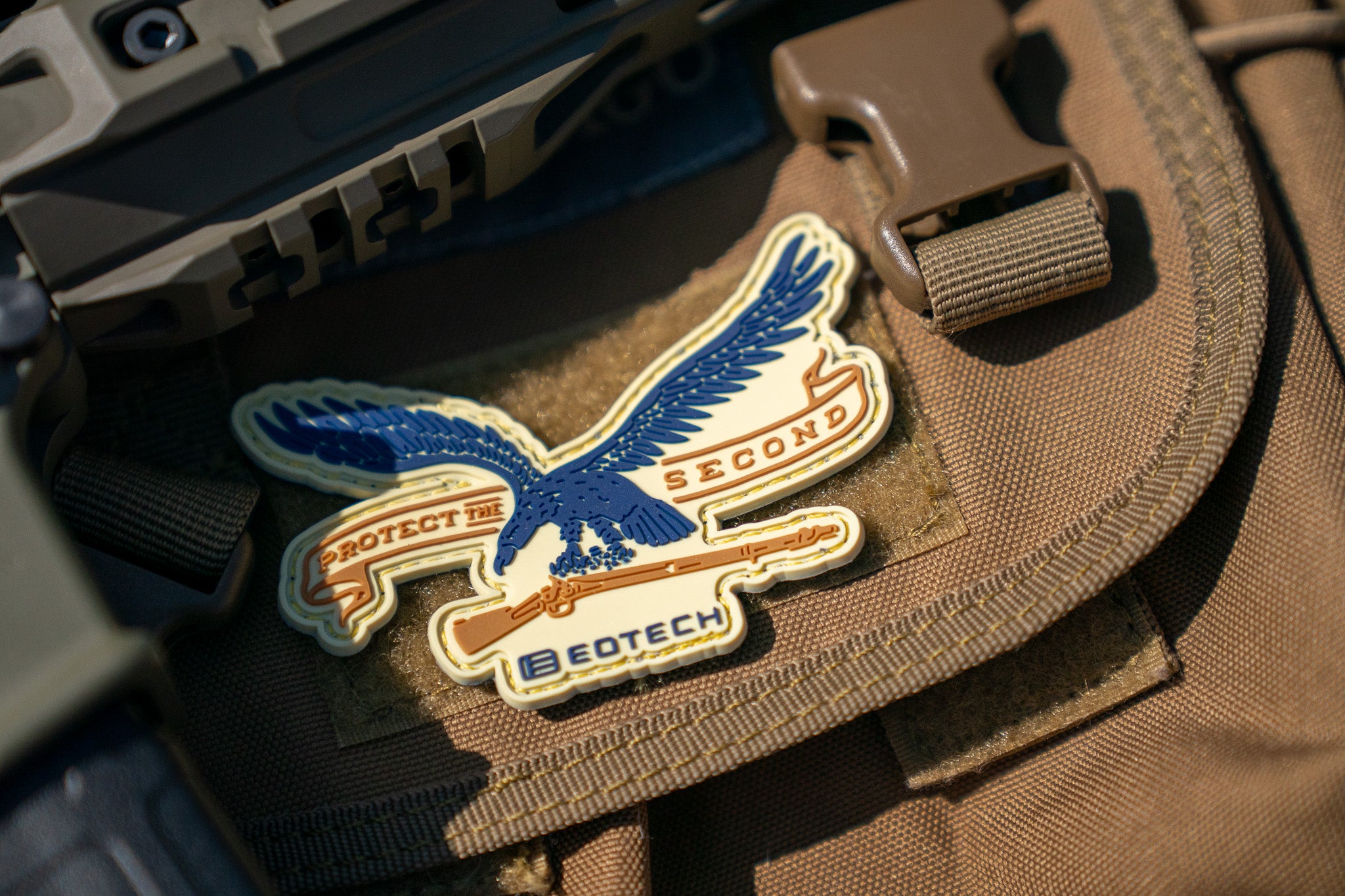 EOTECH Protect Second Amendment Eagle patch on a brown tactical bag
