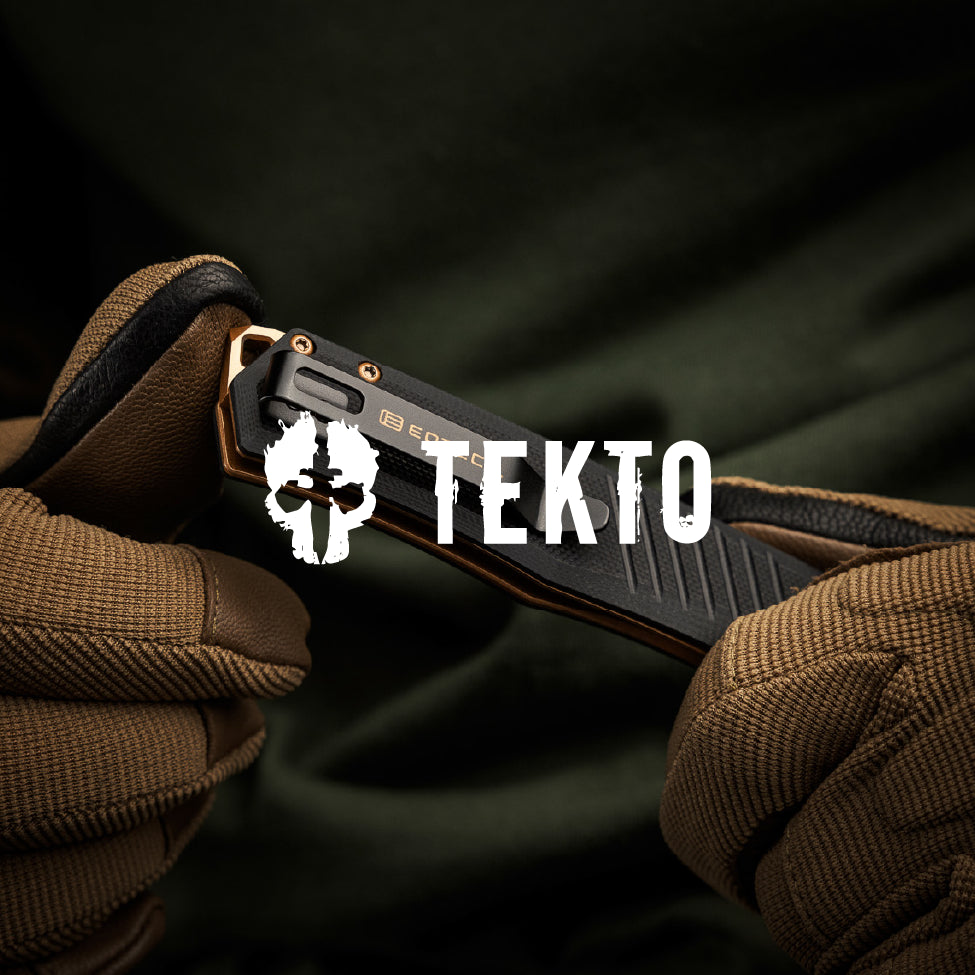 Black pocket knife held between brown gloves with TEKTO and EOTECH logo in the background