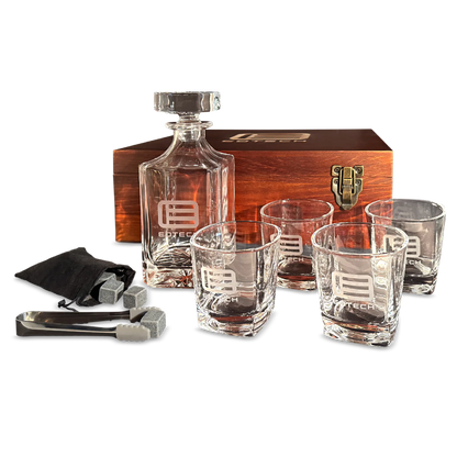 Whiskey decanter set with glasses and accessories on a white background