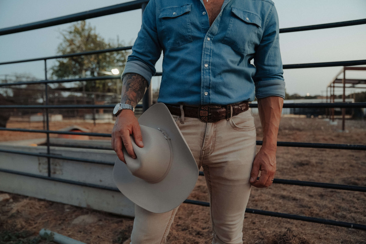 EOTECH ranger belt on man, western setting  with him holding his cowboy hat