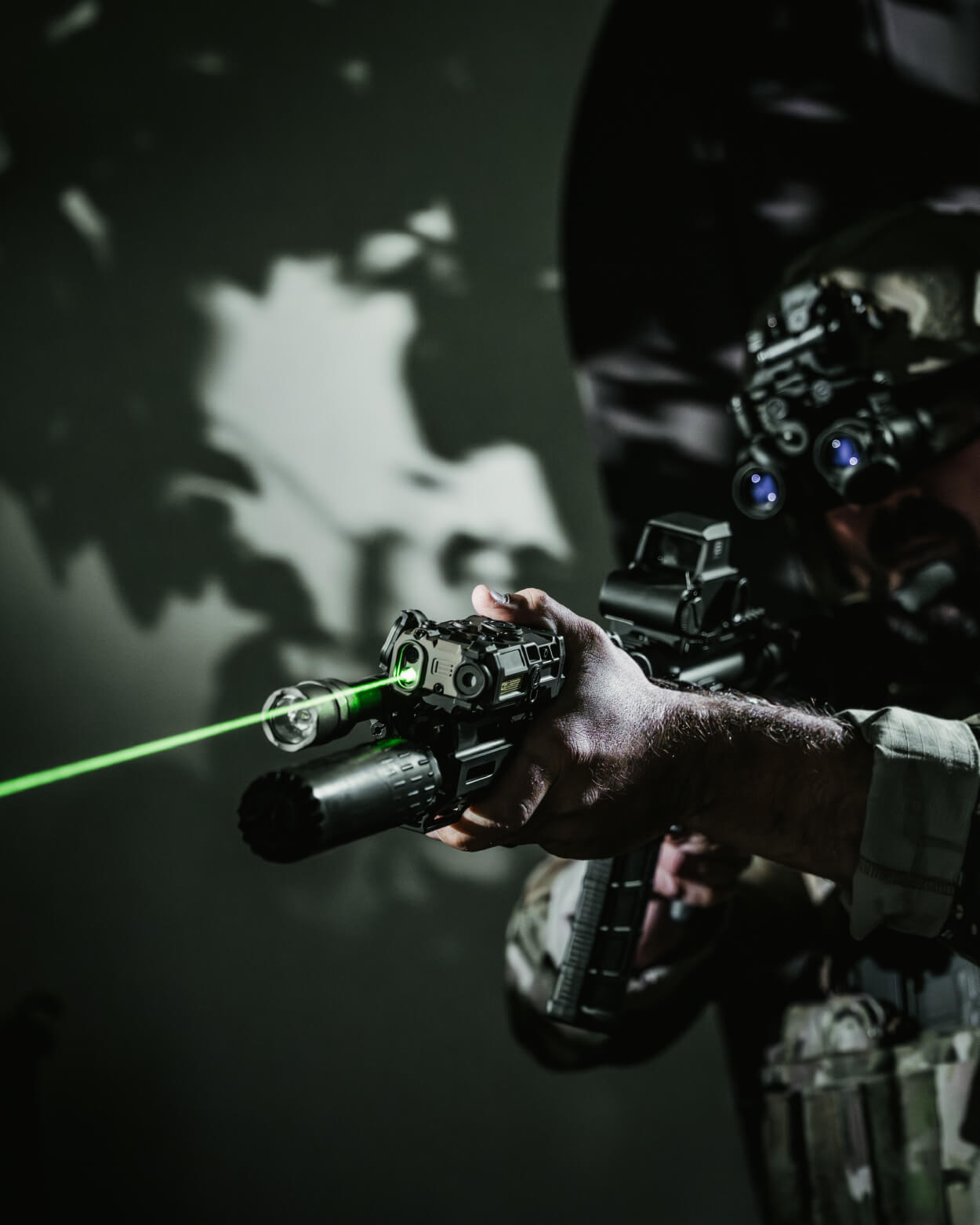 OGL C on a gun green laser shooting out